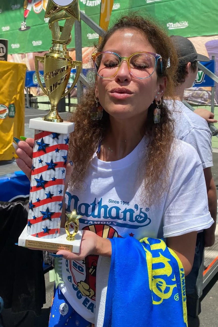 Domenica Dee with Nathan's trophy